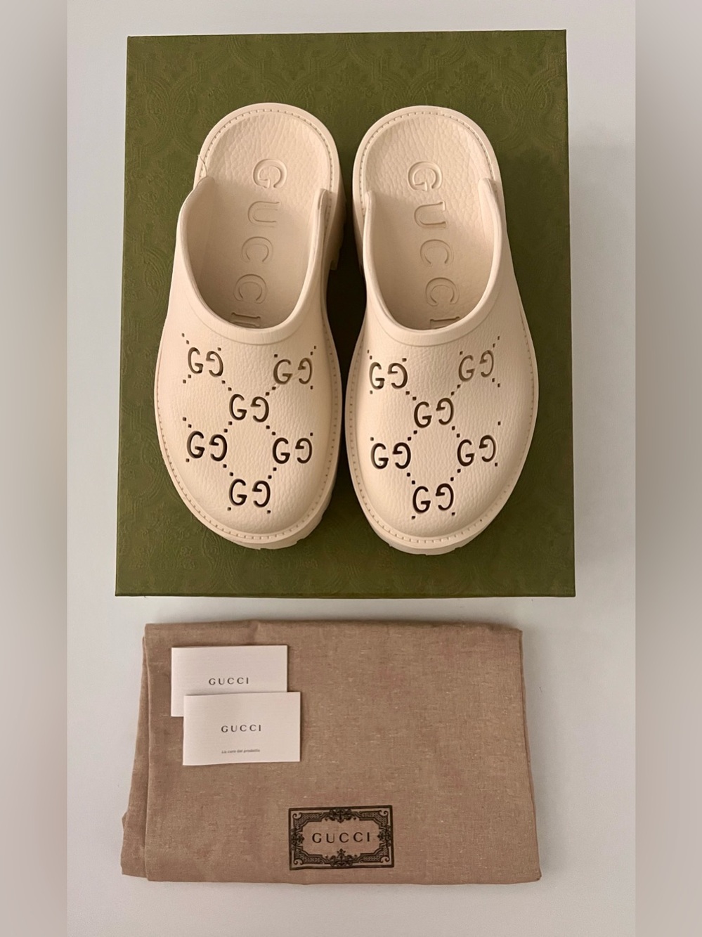 Gucci GG Logo Rubber Mules
Women's Size: 6| IT 36